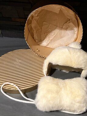 Vintage faux fur hand warmers and hat in storage box